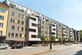 New residential building with retail at Lindemannstraße in Dortmund by Düsseldorf architecture firm greeen! architects